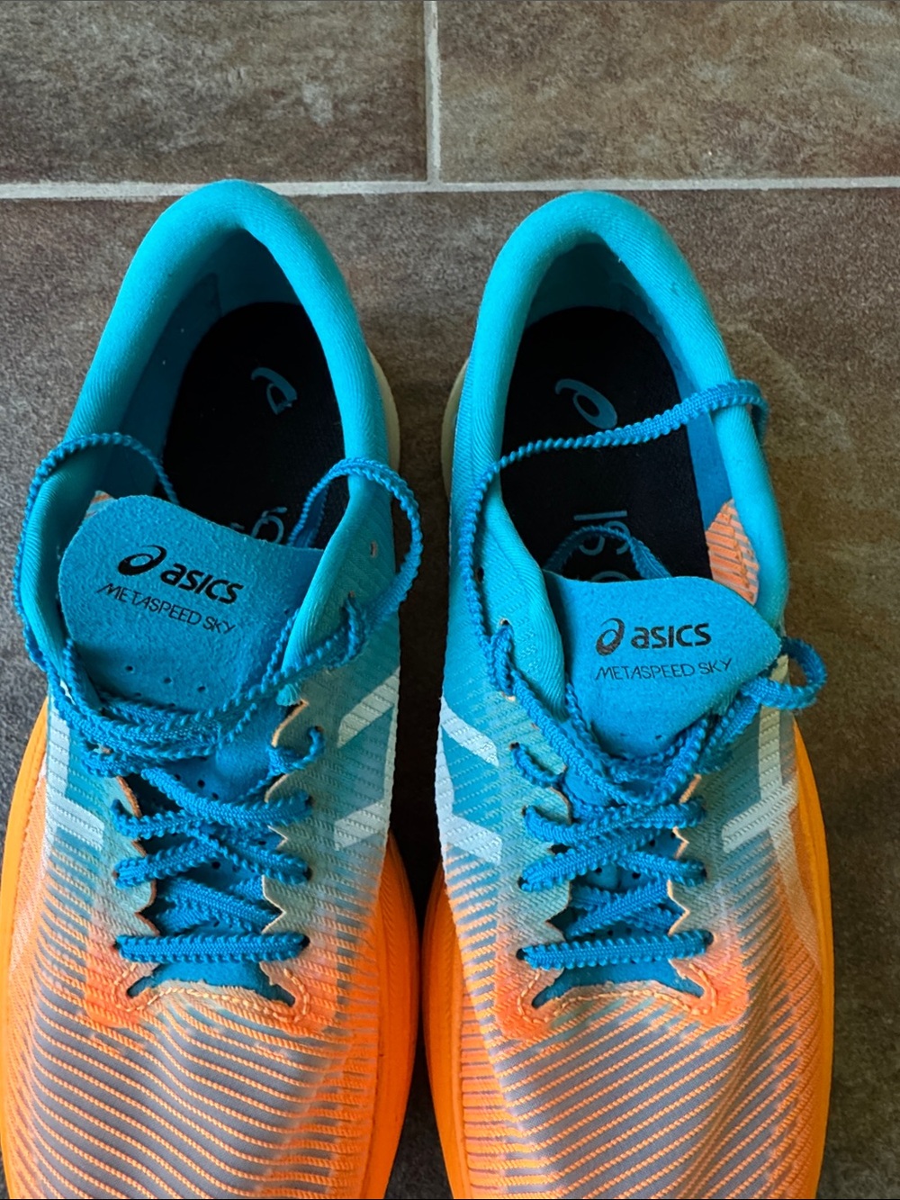Men’s- ASICS Metaspeed racing shoes. Size 9.